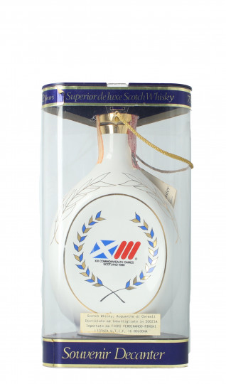 Dimple   Blended  Scotch Whisky 12 Yearf old Bottled 1986 75cl 40% special decanter with box Commonwhealt games - Blended
